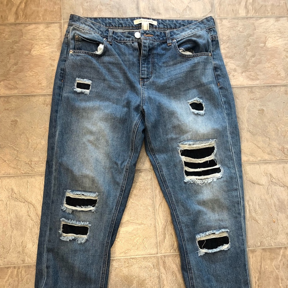 Ripped/ Distressed Blue Jeans